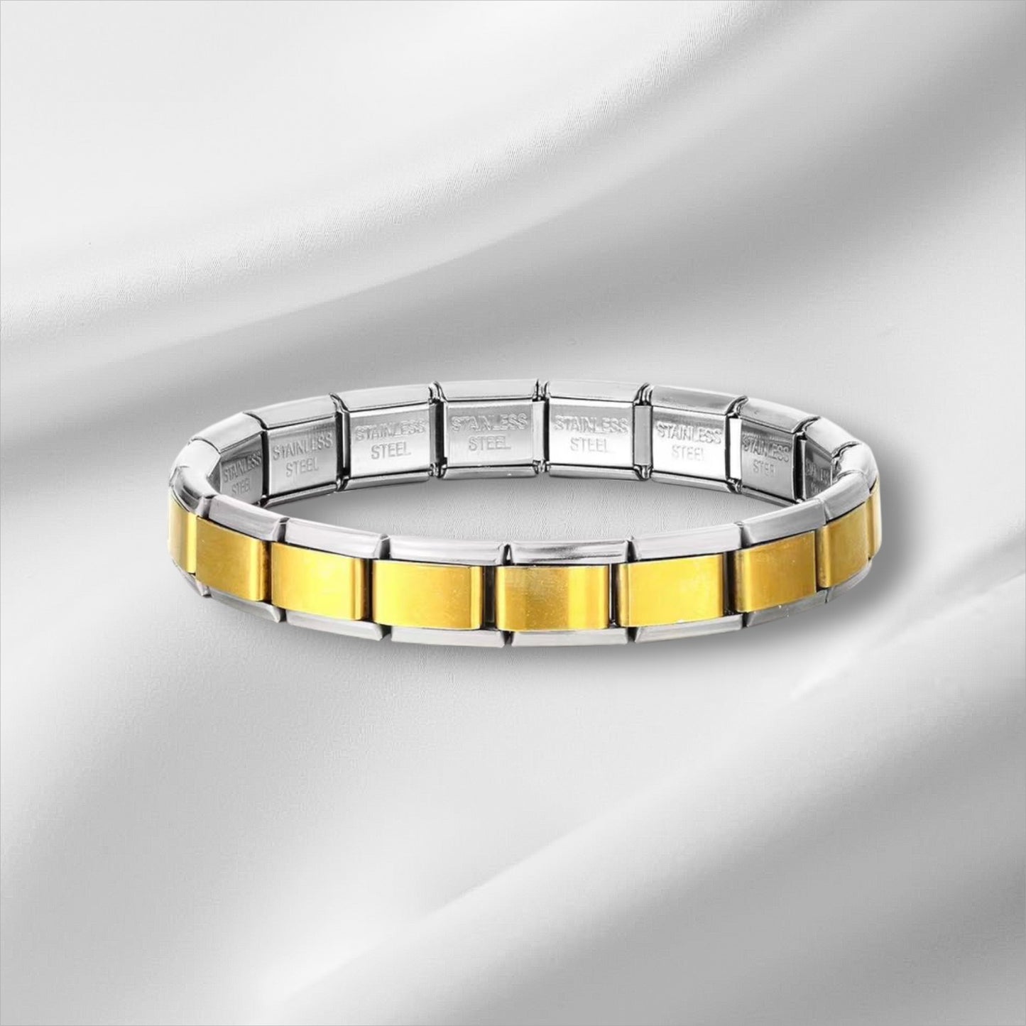 Zelta–sudraba charm aproce